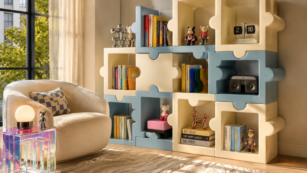 Puzzle-inspired modular bookshelf styled with books in a cozy apartment reading nook.