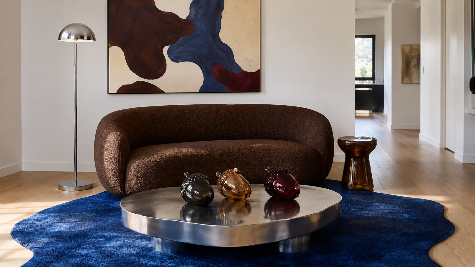Chocolate brown fall decor in a modern living room with cobalt blue and amber accents