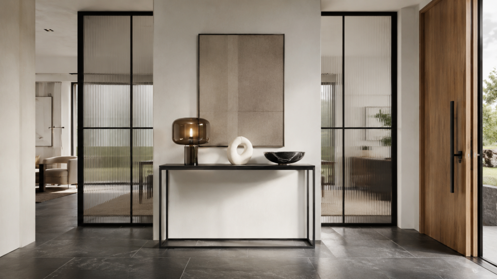Modern console centered between black steel-framed reeded glass partitions.